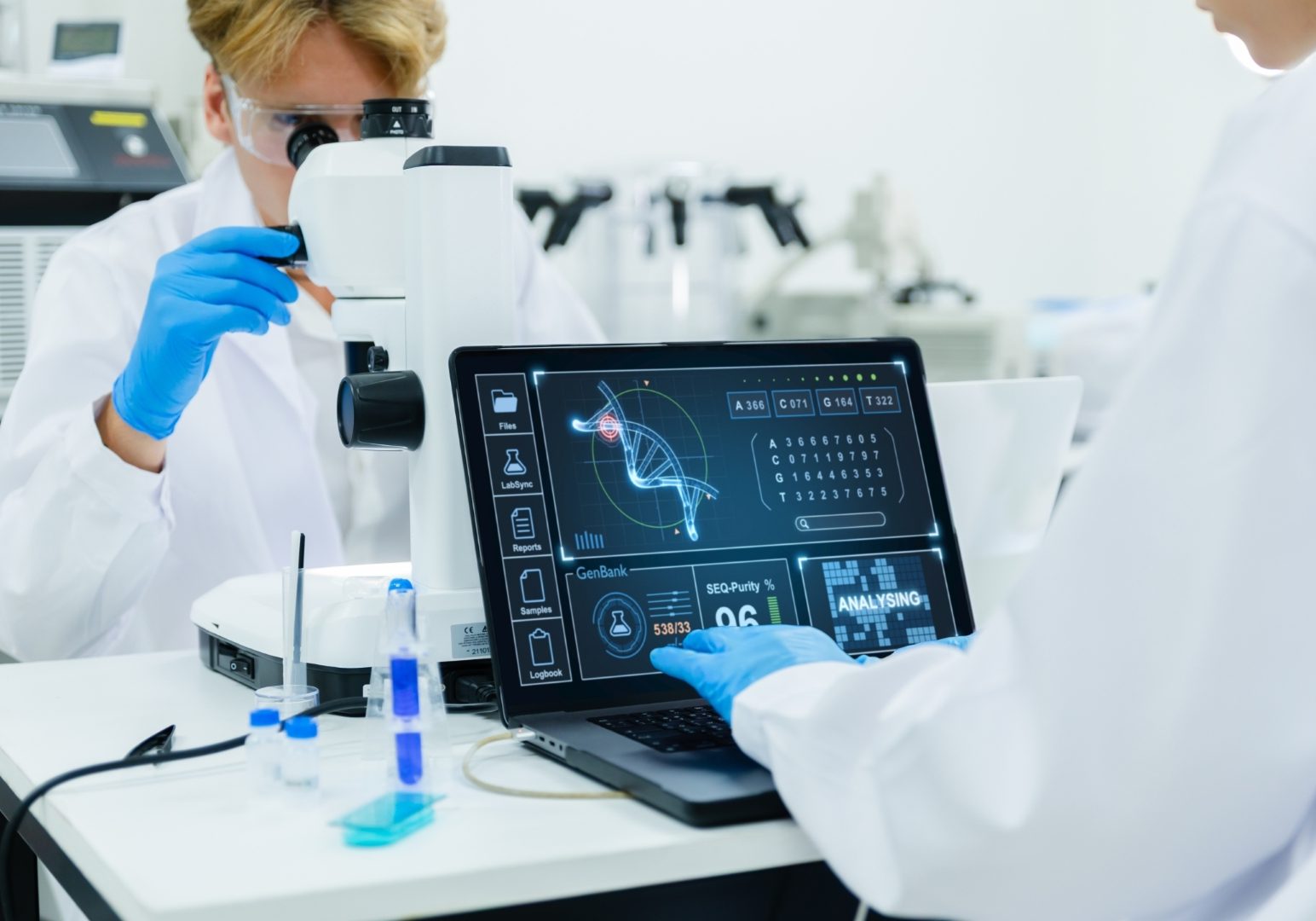 Scientists analyzing DNA data in high-tech lab.